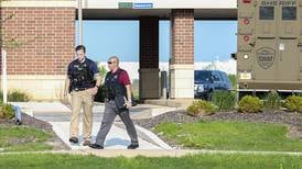 ‘I’m not going to hurt you’: Hostage tells of being held at gunpoint at Romeoville bank
