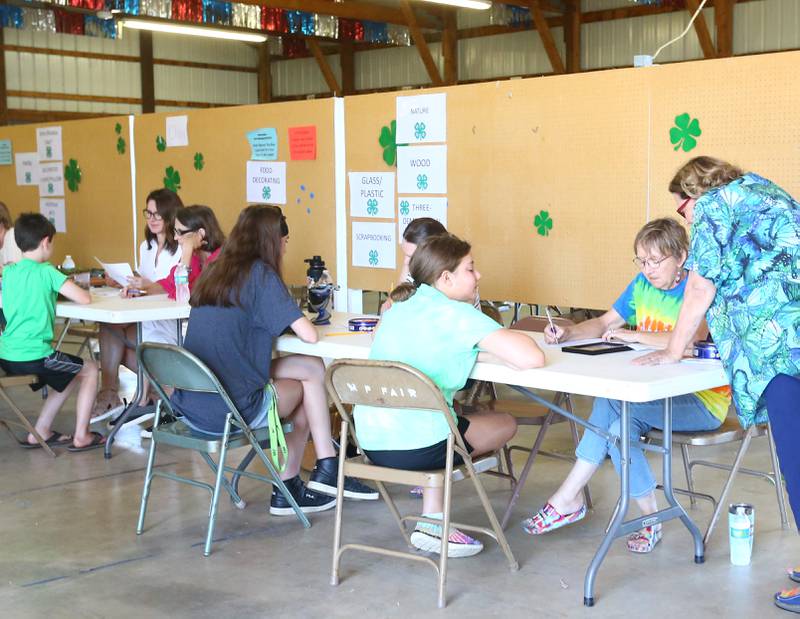 4-H kids have their projects judged during the Marshall-Putnam 4-H Fair on Wednesday, July 20, 2022 in Henry.