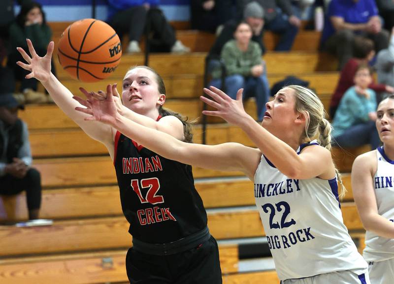 Indian Creek's Bethany Odle and Hinckley-Big Rock's Anna Herrmann go after a rebound during their game Thursday, Jan. 29, 2026, at Hinckley-Big Rock High School.