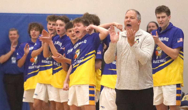 Johnsburg’s players and coaches get revved up as the Skyhawks build a first-half lead over Richmond-Burton in varsity boys basketball onTuesday, Dec. 9, 2025, at Johnsburg High School in Johnsburg.