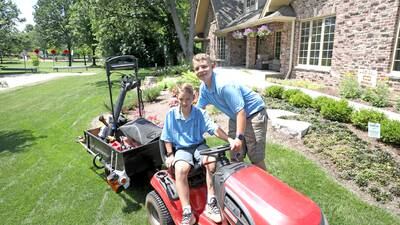 A cut above. Downers Grove brothers building successful landscaping business