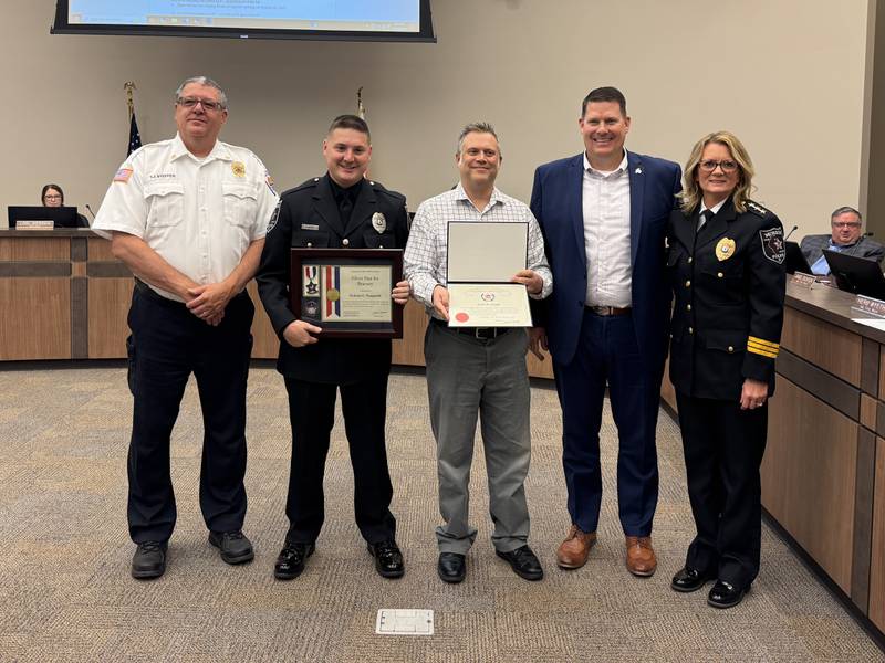 Morris Fire Chief Tracey Steffes, Officer Nick Pampinella, Jason Knapp, Morris Mayor Chris Brown, and Morris Police Chief Alicia Steffes on Monday, Oct. 20, 2025.