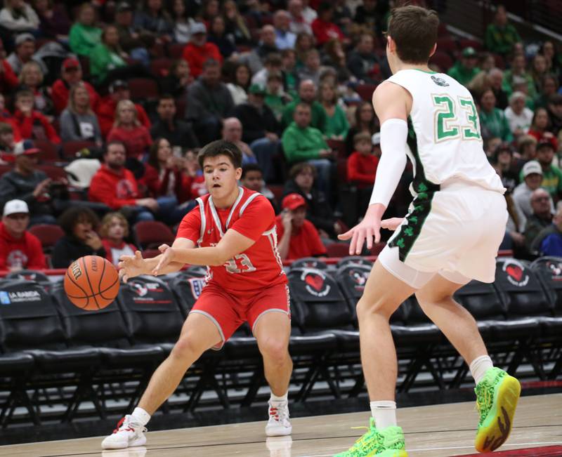 Streator's Logan Aukland passes the ball as Seneca's Brady Sheedy shuts down the lane during a game on Tuesday, Dec. 21, 2023 at the United Center in Chicago.