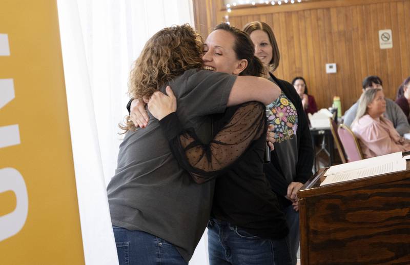 Amber Schmidt (right) was awarded the Campaign Champion award Thursday, May 1, 2025, during the Lee County United Way campaign luncheon celebration. Here, she hugs co-chair Jennifer Lang.