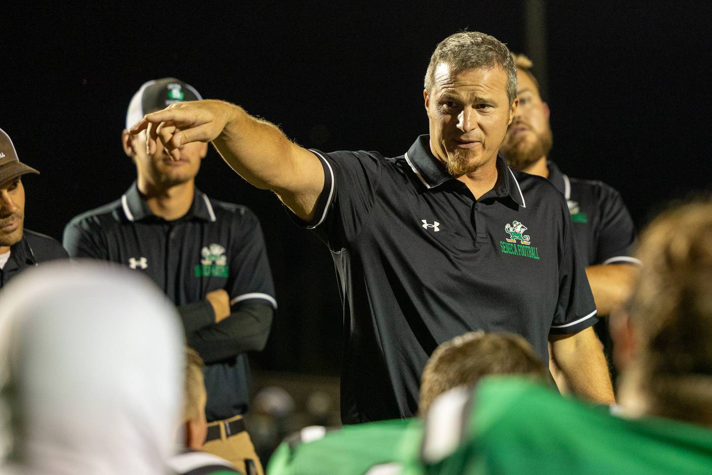 Seneca Head Coach, Terry Maxwell speaks to team after win against Chicago Cristian in home opening game on Friday, Aug 29, 2025 at Seneca High School in Seneca.