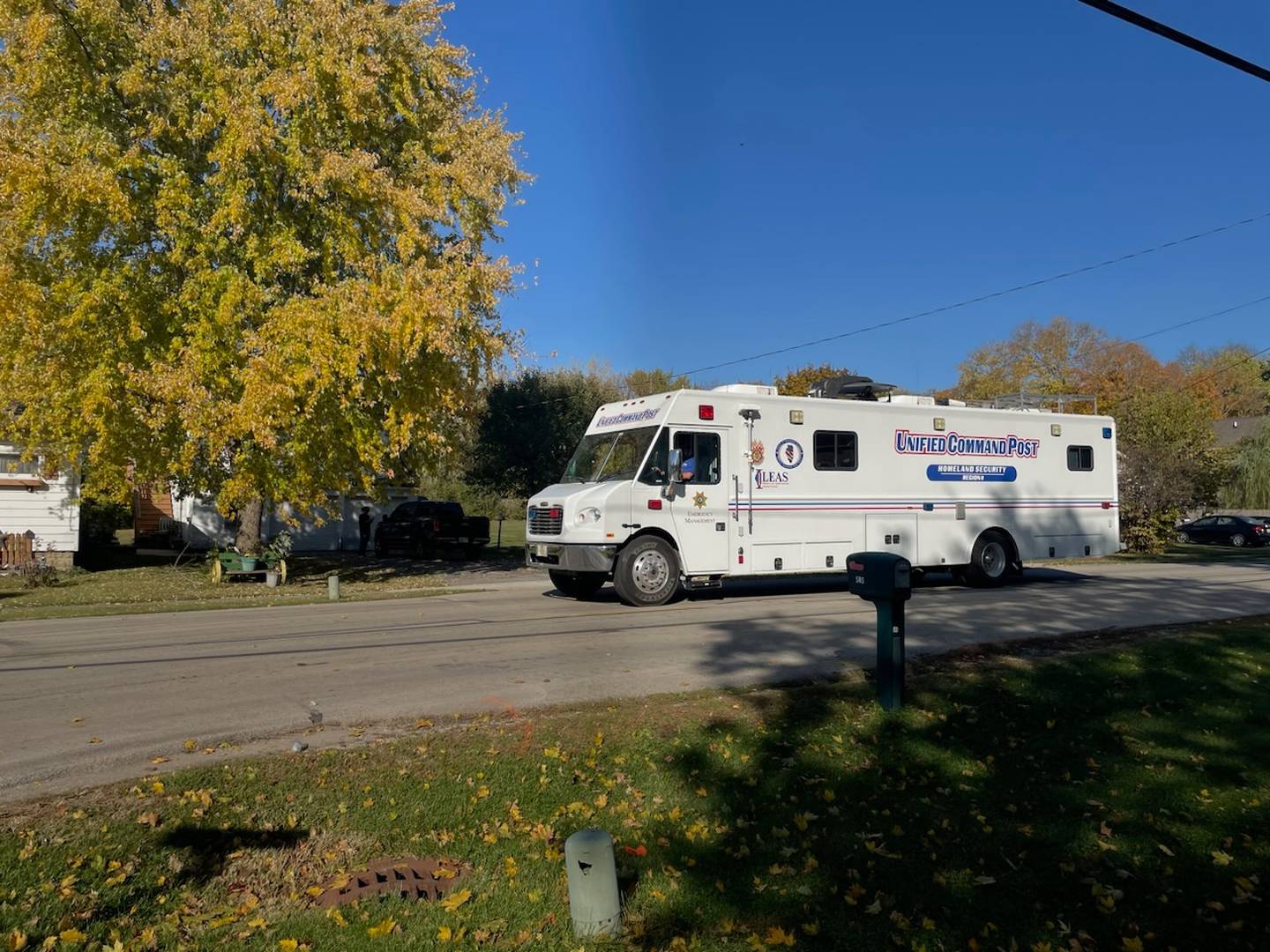 A tactical support vehicle arrives in Sheridan on Saturday, Oct. 22, 2022, as law enforcement is engaged in a standoff with a suspected gunman.