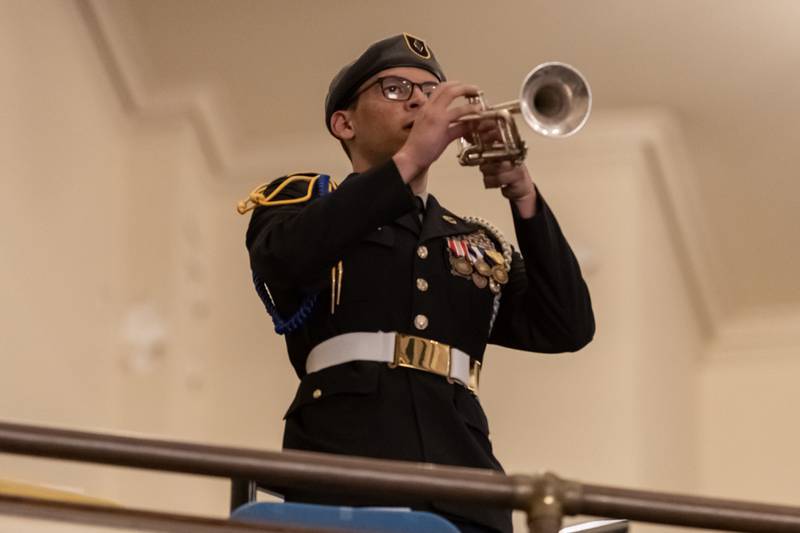Jeremy Lannan plays Echo Taps during the Veterans Day Assembly at Joliet Central High School on Nov. 7, 2025.