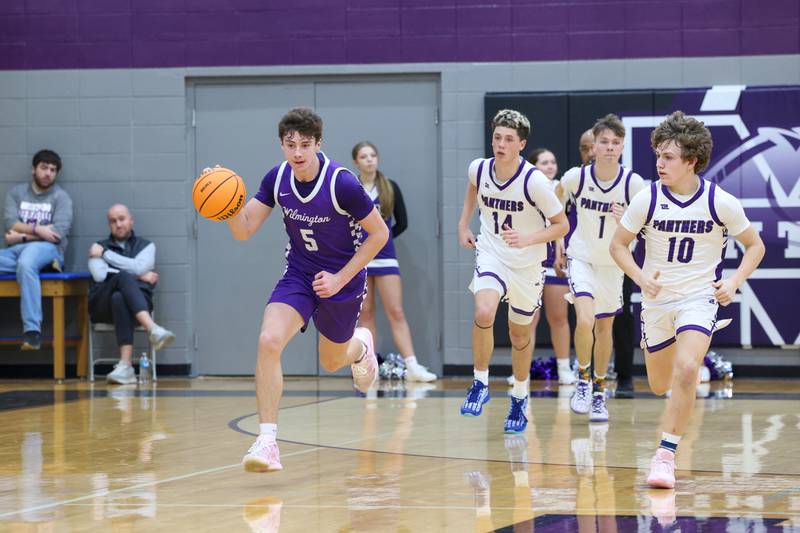 Wilmington's Declan Moran break away with a loose ball during Wilmington's 60-35 victory over Manteno on Tuesday, Feb. 17, 2026.