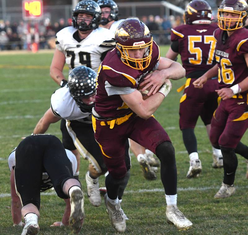 Stockton's Jack Mensendike (24) scores against Lena-Winslow in 1A semifinal action in Stockton on Saturday, Nov. 22, 2025.