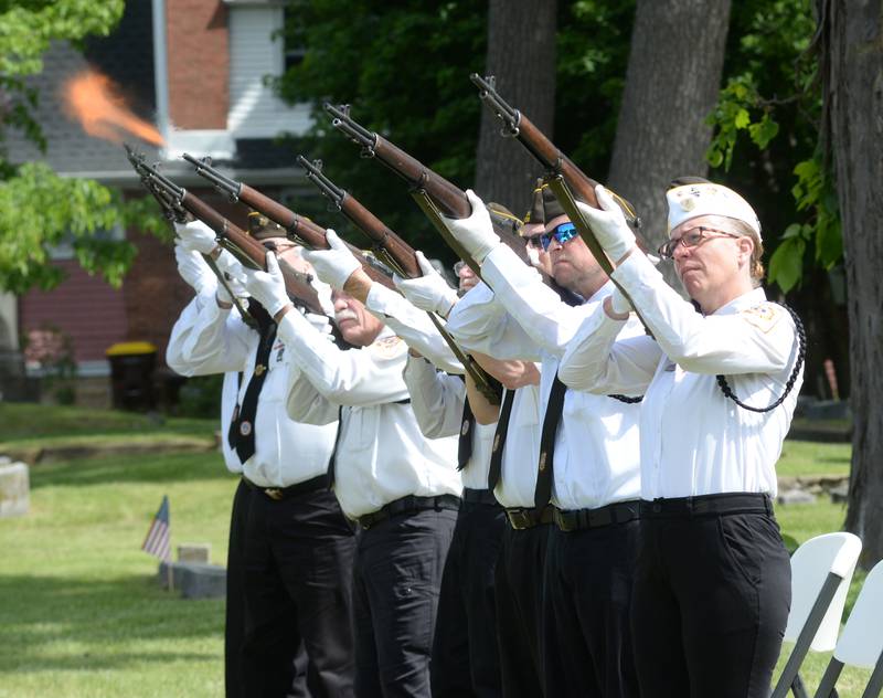 Veterans fire their rifles during the gun salute as part of the Oregon VFW's Memorial Day service at Riverside Cemetery in Oregon on Monday, May 26, 2025.