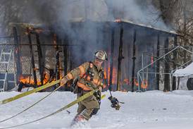 Dixon firefighters battle shed fire