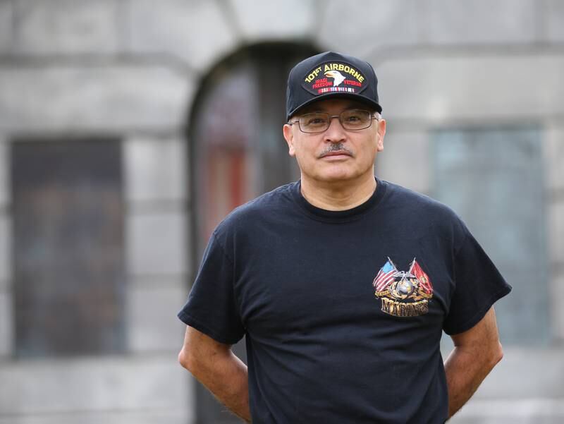 Veteran Hector Gomez poses next to the Soldiers and Sailors Monument on Friday, Oct. 27, 2023 in Princeton.