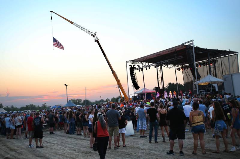 The sun sets over the stage on Thursday, Aug. 24, 2023 at the Bureau County Fair in Princeton.