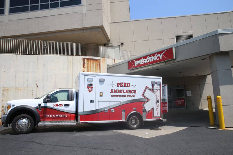 A Peru ambulance takes a patient into the emergency room entrance at OSF Saint Elizabeth Hospital on Tuesday, June 20, 2023 in Ottawa.