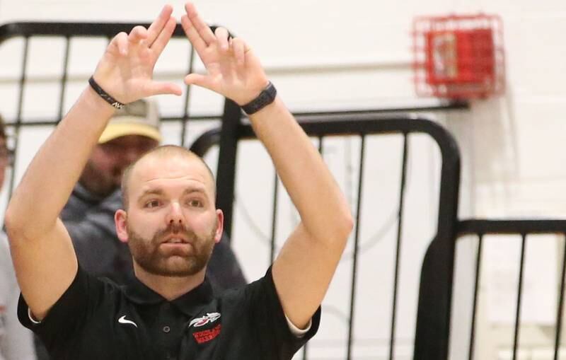 Woodland head boys basketball coach Connor Kaminke talks to his team while playing Flaganan-Cornell during the Route 17 Classic Tournament on Wednesday, Nov. 27, 2024 at Woodland High School.