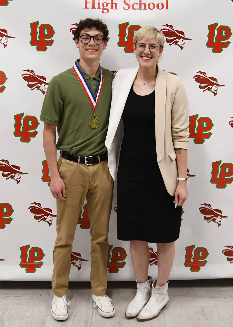 Riley O’Brien (left) received the 2023 Illinois Science Teachers Physics Award at La Salle-Peru High School.