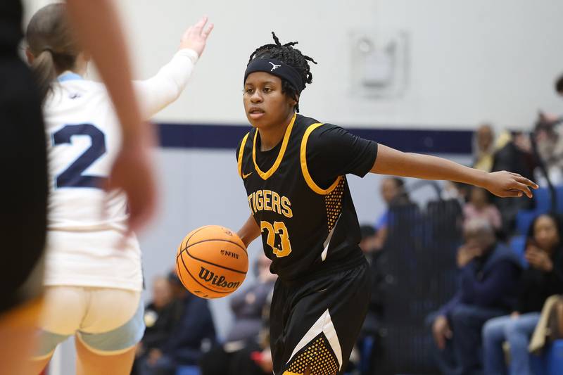 Joliet West’s Keniya Foster looks for a play against Plainfield South on Thursday, Jan 22, 2026 in Plainfield.