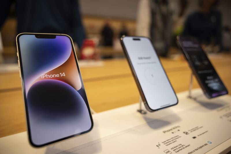 FILE - The iPhone 14, iPhone 14 Pro and iPhone 14 Pro Max are displayed at the Apple Fifth Avenue store, Friday, Sept. 16, 2022, in New York. (AP Photo/Yuki Iwamura, File)