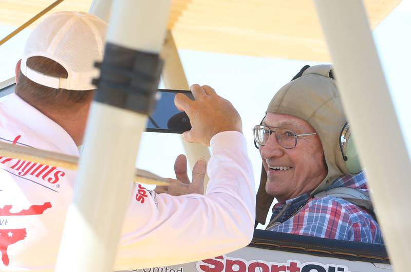 Veteran Scott Gerbitz of Princeton, has his photo taken before departing in a 1942 Boeing Stearman A-75 Primary Trainer during a Veteran Dream Flight on Tuesday, Sept 2, 2025 at the Illinois Valley Regional Airport in Peru.