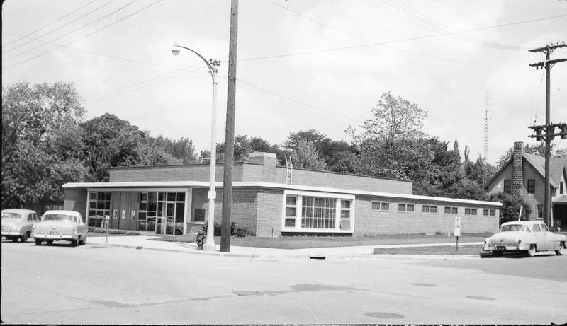 Looking northwest at the DeKalb-Ogle Telephone Company at Locust and Third Streets in DeKalb in June 1959.