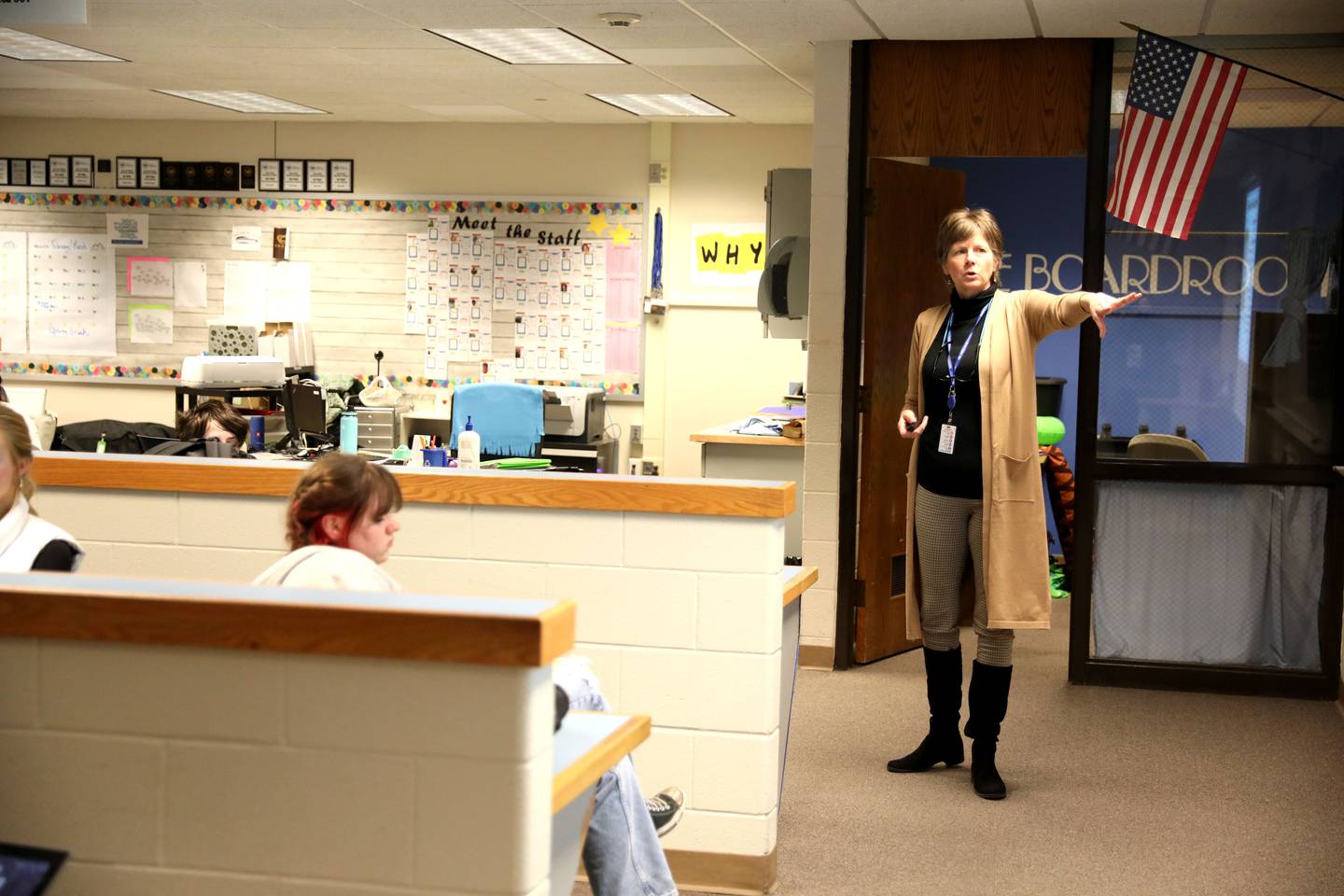 Jamie Dunlap teaches a business class at Geneva High School. Dunlap became a teacher after a becoming a certified public accountant and running several of her own businesses.