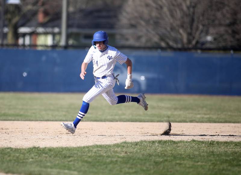 Geneva’s Nick Price runs to third base during a home game against Wheaton Warrenville South on Monday, April 8, 2024.