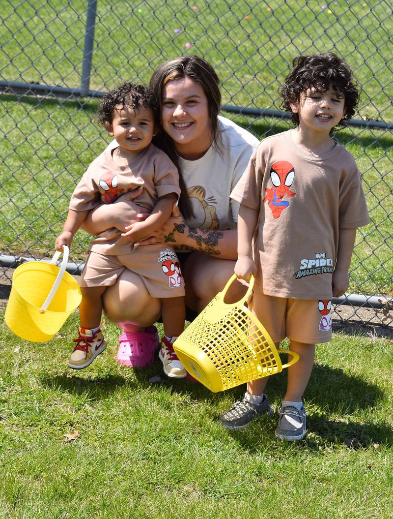 Elizabeth Raymond, with Zikari (left) and Zakyis excitedly wait for the Coloma Park District egg hunt to begin on April 12th, 2025 in Rock Falls.