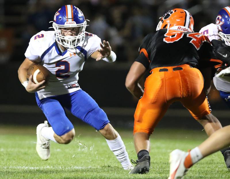 Genoa-Kingston's Brody Engel tries to fend off a Byron defender during their game Friday, Sep. 17, 2021, at Byron High School.