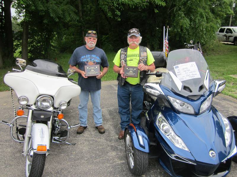Pictured are Brent Martin, first place winner at the Plano American Legion Car and Bike Show, and Cliff Oleson, who took second place, with their plaque-winning bikes.