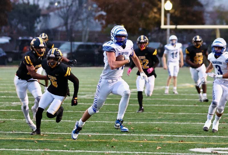 Princeton's Noah LaPorte takes in a touchdown reception to give the Tigers a 27-8 halftime lead over Chicago King in Saturday's game in Chicago. The Tigers won 34-16.