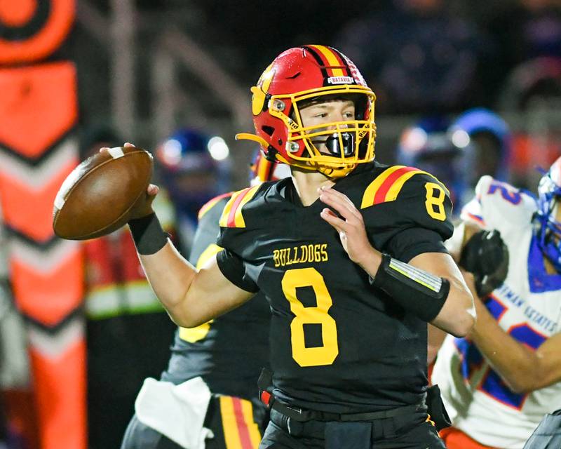 Batavia's Michael Vander Luitgaren (8) passes the ball during the game on Friday Oct. 31, 2025, while taking on Hoffman Estate during the first round of playoffs held at Batavia High School.
