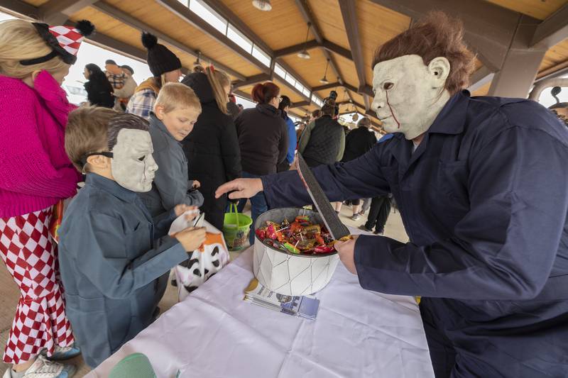 Mini Michael Myers meets his future Tuesday, Oct. 28, 2025, during Sterling Police Department’s annual trunk-or-treat. Due to rain, the event was moved to the Pavilion for some shelter.