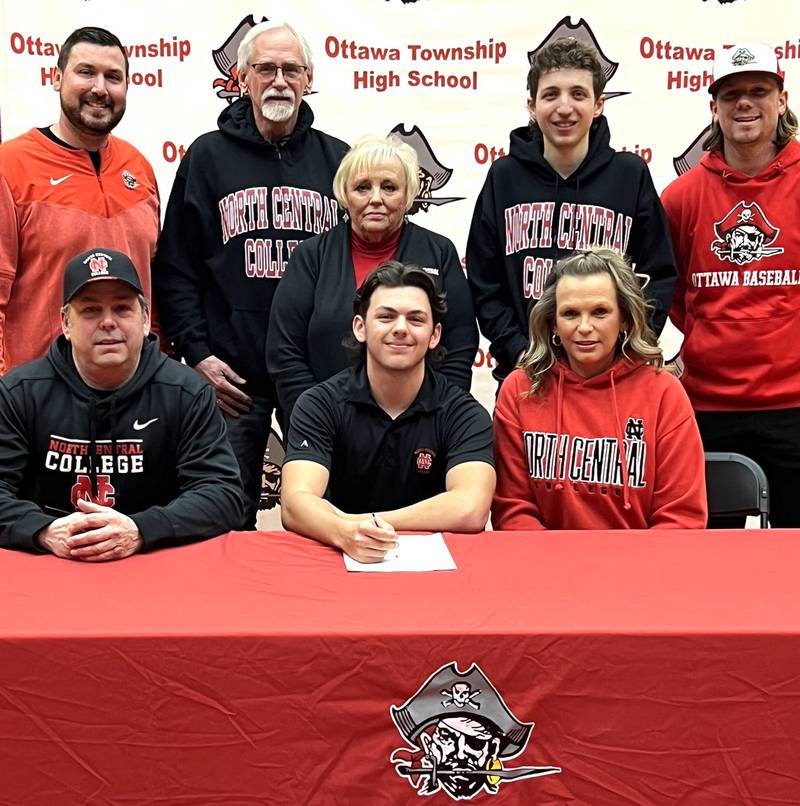Ottawa’s Cam Loomis has signed on to continue his education at North Central College in Naperville and his football and baseball careers at the NCAA Division 3 level with the Cardinals. Loomis, a kicker/punter in football, pitcher in baseball and a second-team member of The Times All-Area Team in both sports this past season, is pictured front and center at his signing ceremony surrounded by family as well as Ottawa football coach Chad Gross (back, left) and baseball coach Tyler Wargo (back, right).