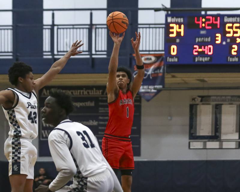 Bolingbrook's Brady Pettigrew (1) shoots a jumper during their basketball game between Bolingbrook at Oswego East Friday, Jan 30, 2026 in Oswego.