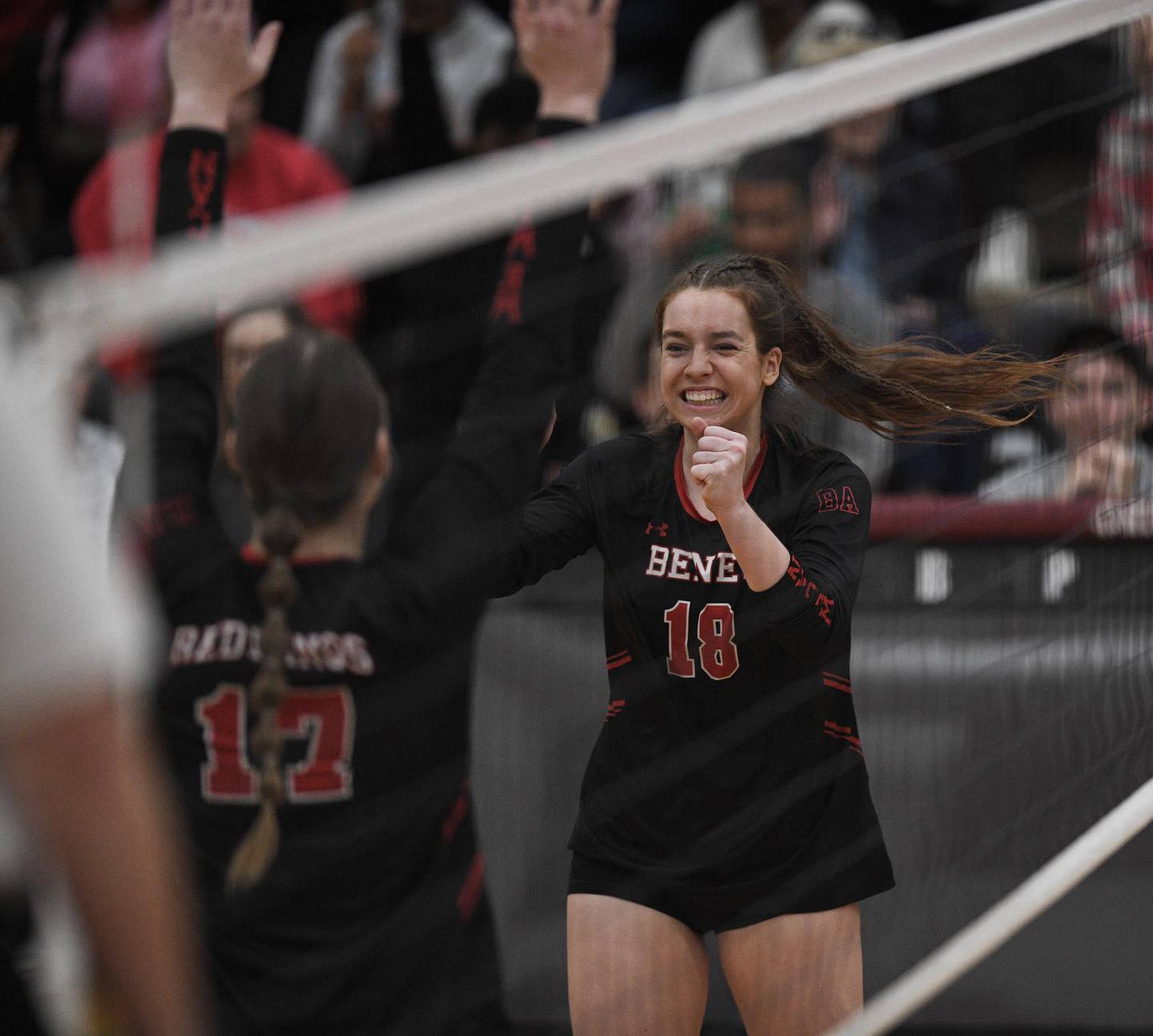 John Starks/jstarks@dailyherald.com
Benet’s Gabija Staniskis and Annie Eschenbach, left, celebrate a point against Naperville North in the Class 4A Sectional championship match in Plainfield on Wednesday, November 2, 2022.