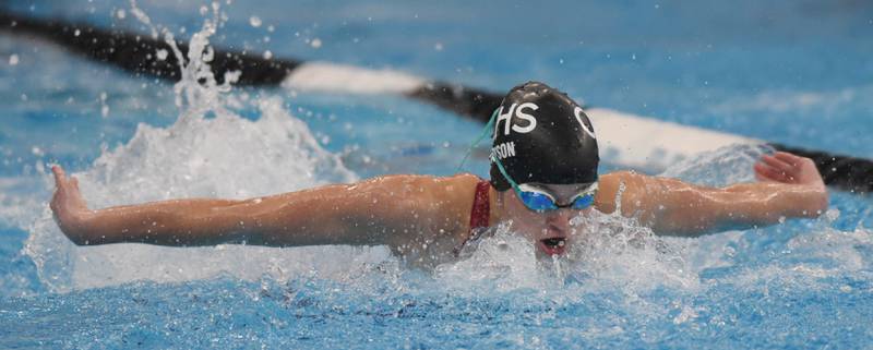 Crystal Lake South's Avery Watson swims in the consolation heat of the 100-yard butterfly during the IHSA girls state swimming finals at FMC Natatorium in Westmont on Saturday, Nov. 12, 2022.