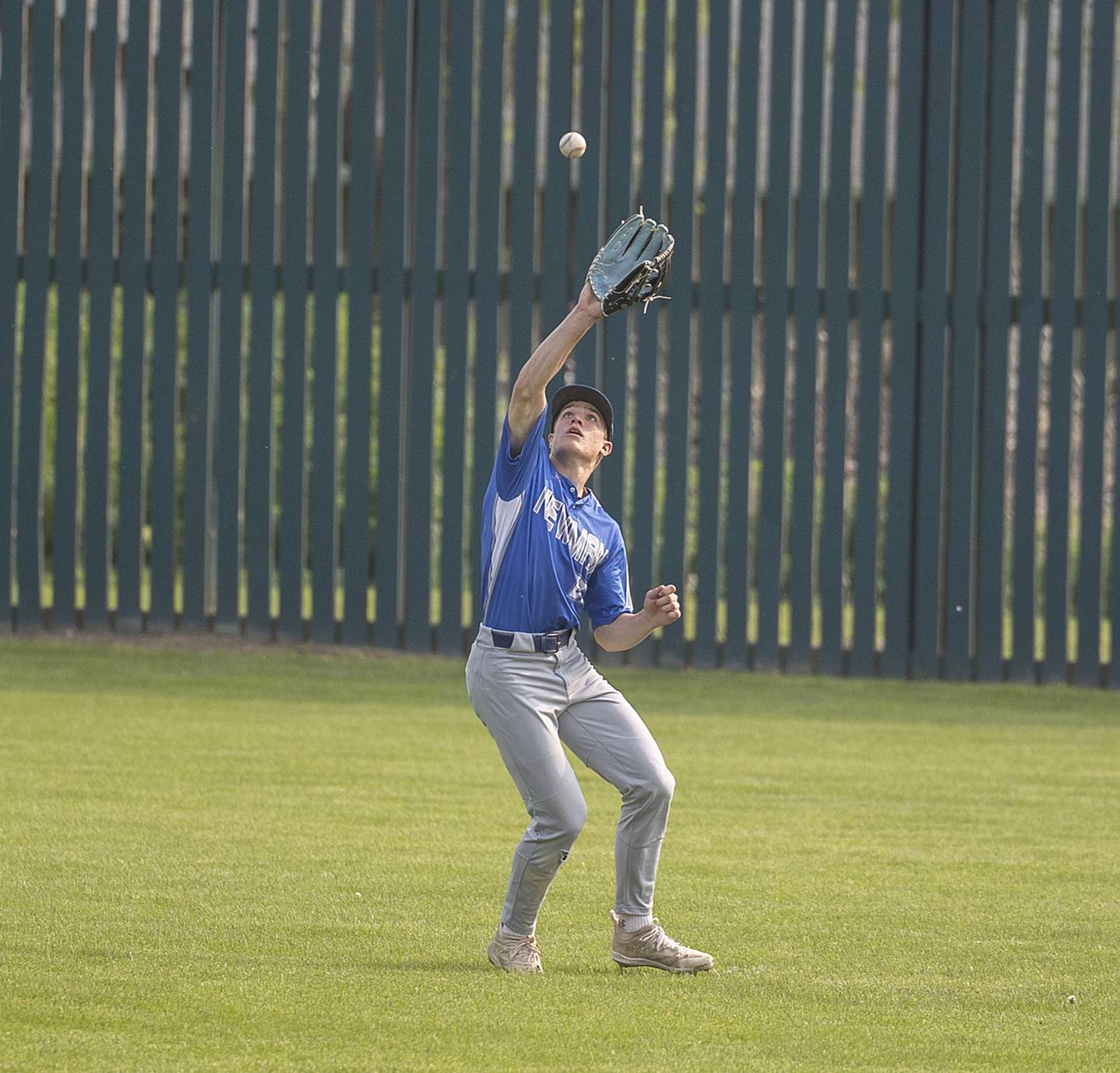 Newman’s Brendan Tunink hauls in a fly ball against Amboy Thursday, May 18, 2023.
