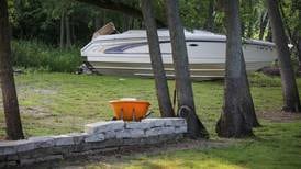 Man found dead in speedboat in Holiday Hills yard off Fox River