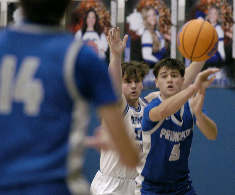 Princeton's Jack Oester passes the ball to Jackson Mason.. 1-3 Princeton played Newman (3-0) in a conference game. The matchup took place at Newman High School on Friday, December 5, 2025.