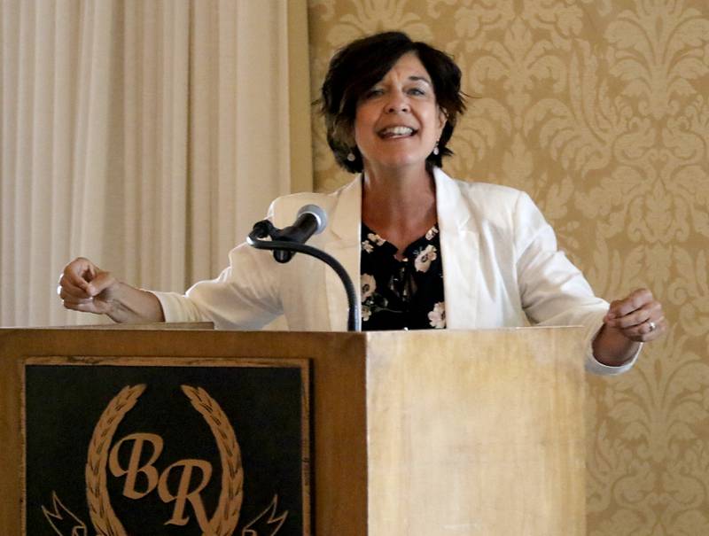 Award recipient Lisa Orris speaks during the Northwest Herald's Women of Distinction award luncheon Wednesday June 7, 2023, at Boulder Ridge Country Club, in Lake in the Hills. The luncheon recognized 10 women in the community as Women of Distinction.