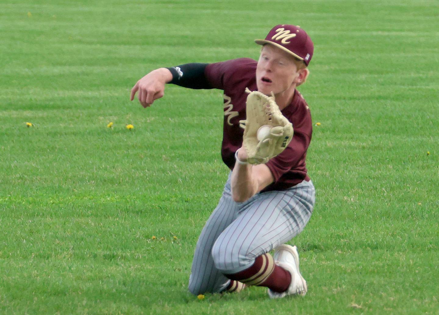 Morris's RJ Kennedy makes a running catch in left field on Friday, April 17, 2026 at Huby Sarver Field in the L-P Athletic Complex in La Salle.