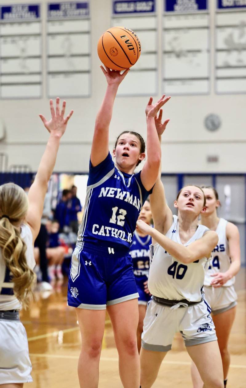 Newman's Lucy Oetting fires away against Princeton Saturday night at Prouty Gym.
