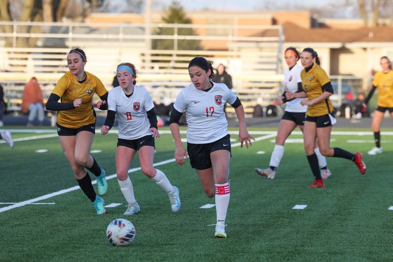Bradley-Bourbonnais' Sophia DeCarlo advances the ball away from Herscher's offense during the Boilermakers' 3-2 loss to Herscher on Tuesday, April 15, 2025.