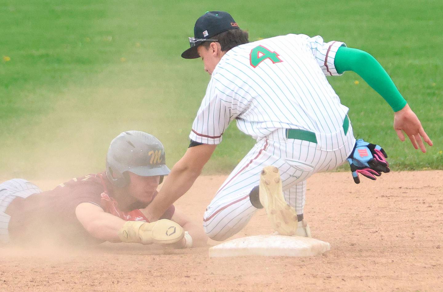 Morris's Brycen Johnson is tagged out at second base by L-P's Jett Hiil after overshooting the bag on Friday, April 17, 2026 at Huby Sarver Field in the L-P Athletic Complex in La Salle.