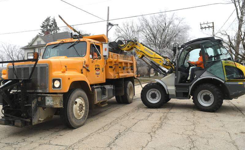 Mt. Morris village workers were busy Thursday cleaning up after an ice storm, coupled with strong winds, knocked down branches and trees. Strong winds continued across the region Thursday causing more electrical outages.