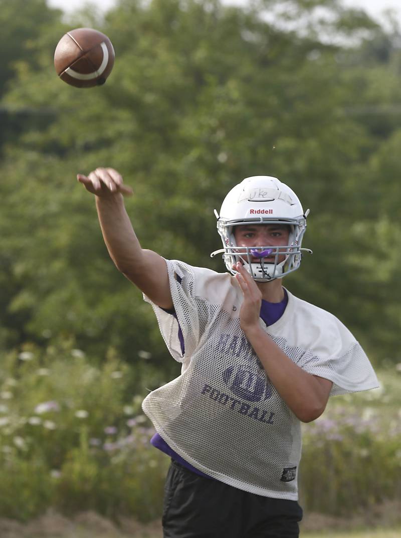 Hampshire’s Luke Lacke throws the ball during the first day of football practice Monday, August 7, 2023, at Hampshire High School.