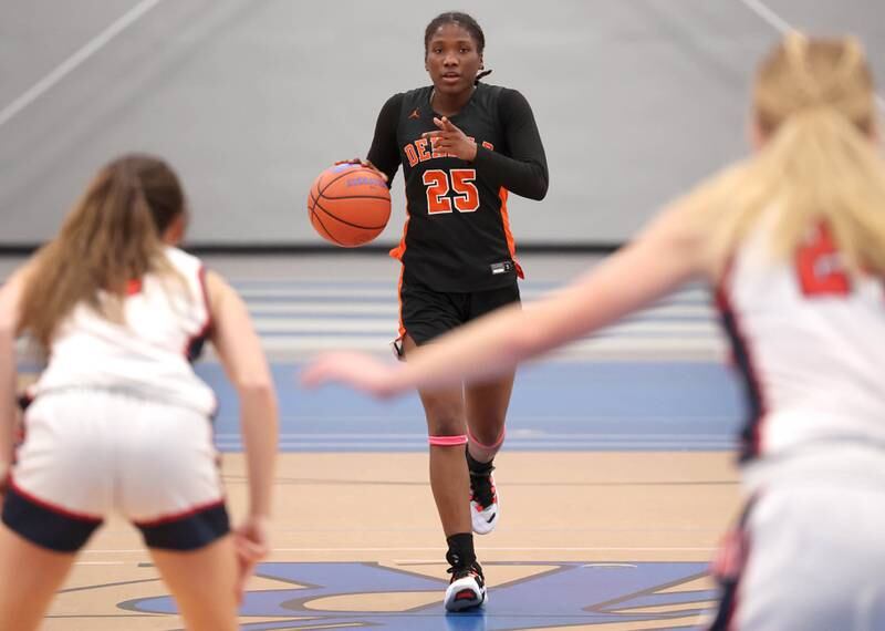DeKalb’s Kezaria Mitchell brings the ball up court against the Belvidere North defense during their game Friday, Nov. 17, 2023, in the Mark Einwich Varsity Girls Basketball Rockets Kickoff Tournament at Burlington Central High School.