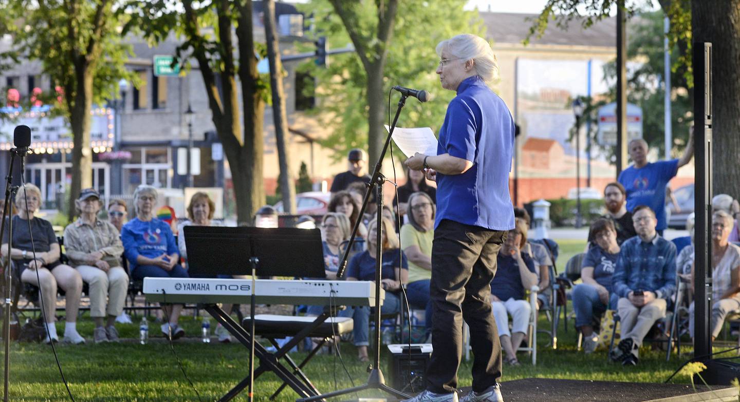 Rev. Jennifer Amy-Dressler, of Open Table United Church of Christ, speaks to the crowd gathered for the Pride Night of Remembrance event Friday, June 9, 2023, at Washington Square in Ottawa.