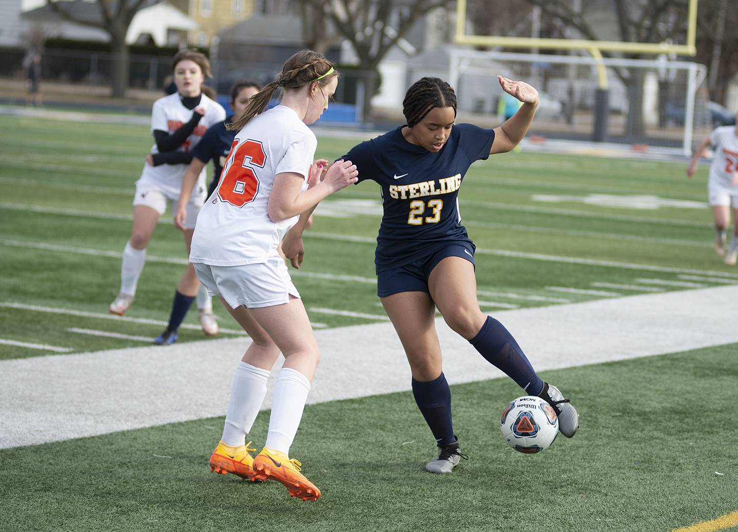 Sterling's Chelsey Chatters handles the ball against Winnebago's Hannah Lee Thursday, March 17, 2022.