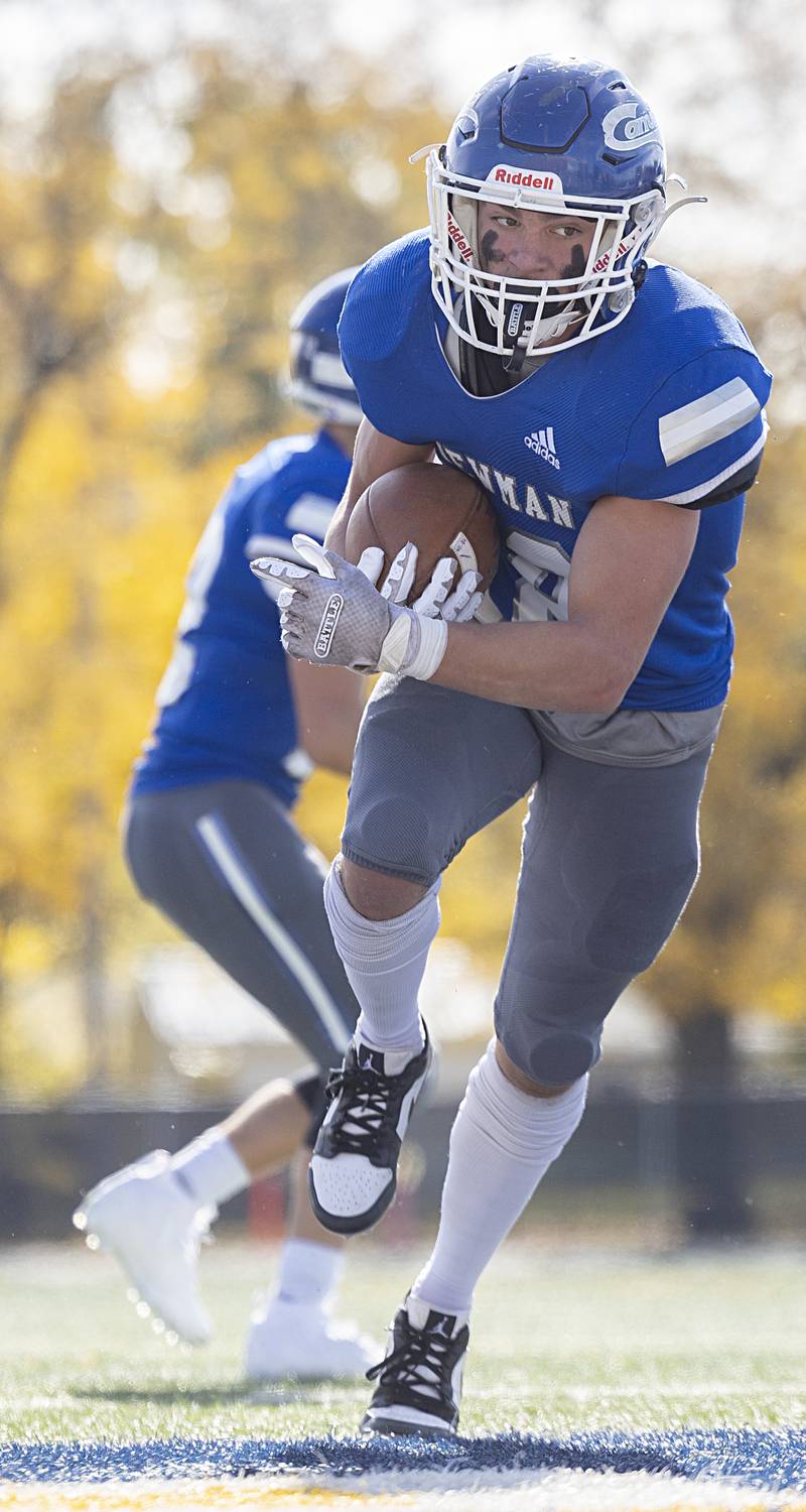 Newman’s Brady Grennan runs up the middle for a score against ROWVA Saturday, Oct. 28, 2023 in the Class 1A playoffs in Sterling.